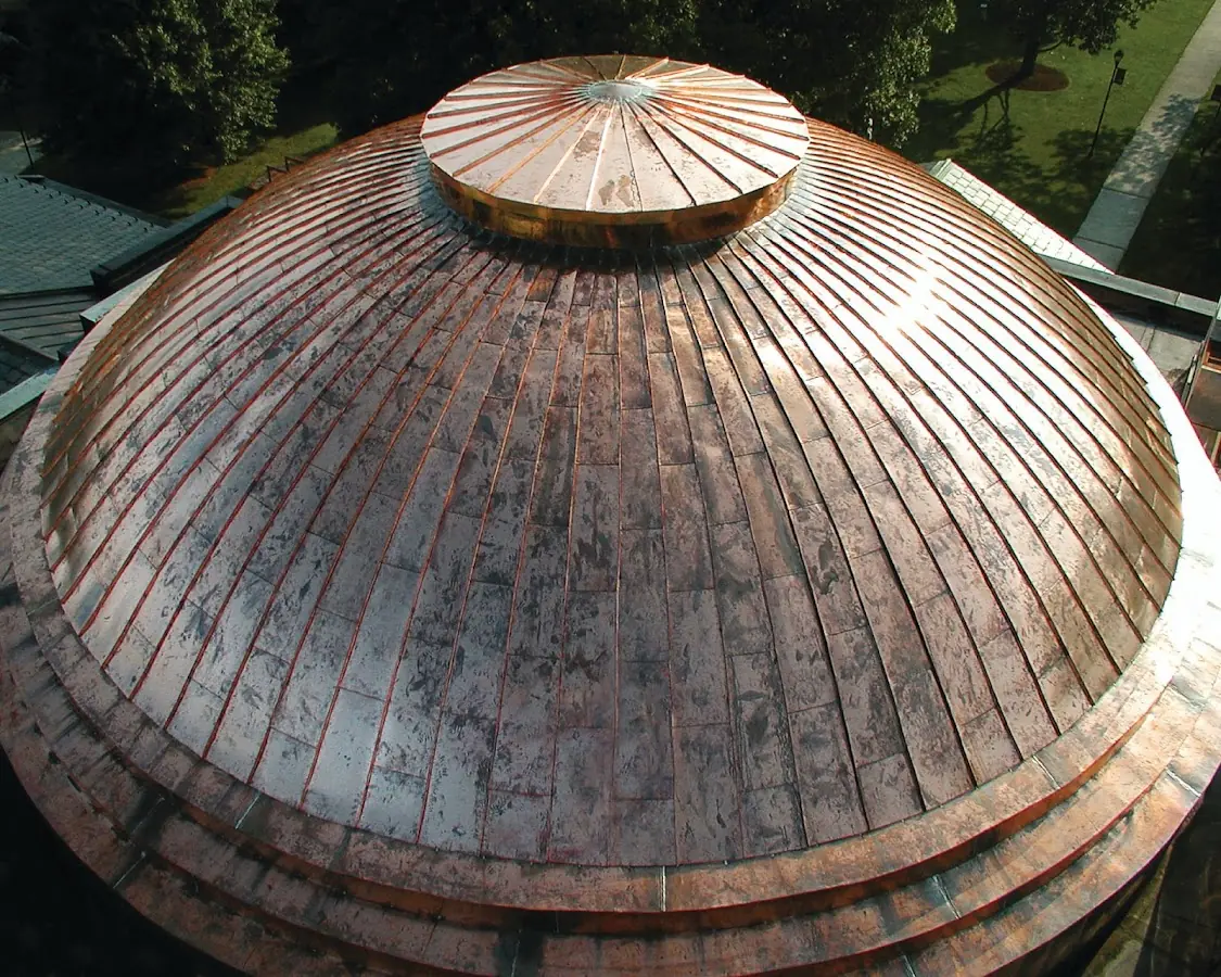 Craftsman Roofing crew installing a new roof in Astrodome